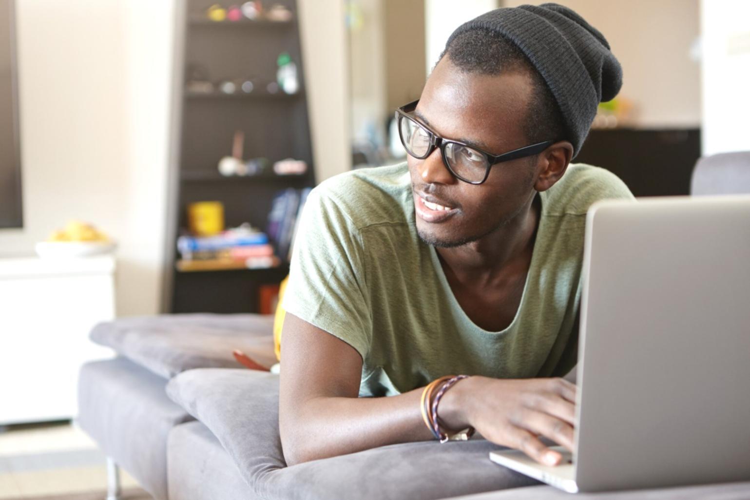 Developer reviewing test results and code coverage metrics on multiple monitors