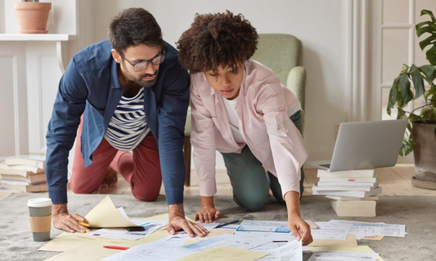 Developers collaborating on unit testing strategies in modern workspace